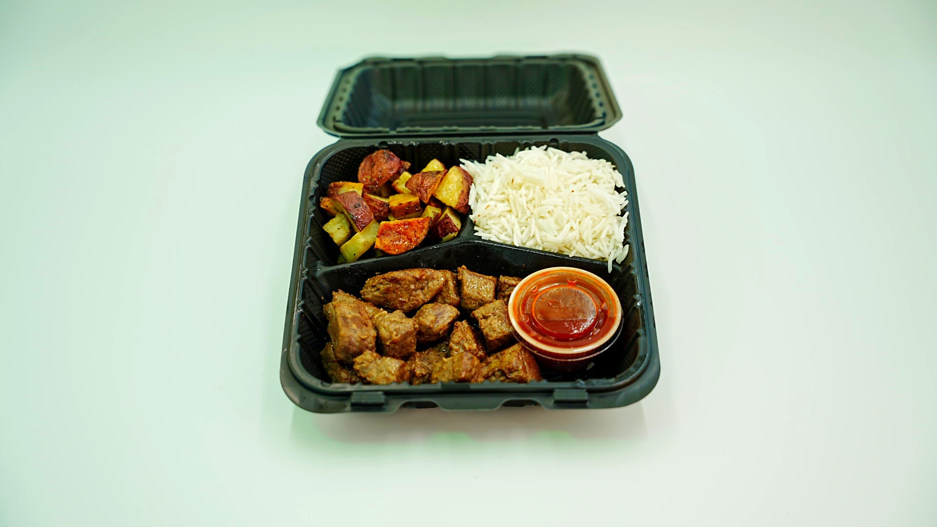 Cayenne Fire Steak w/Potatoes & Rice